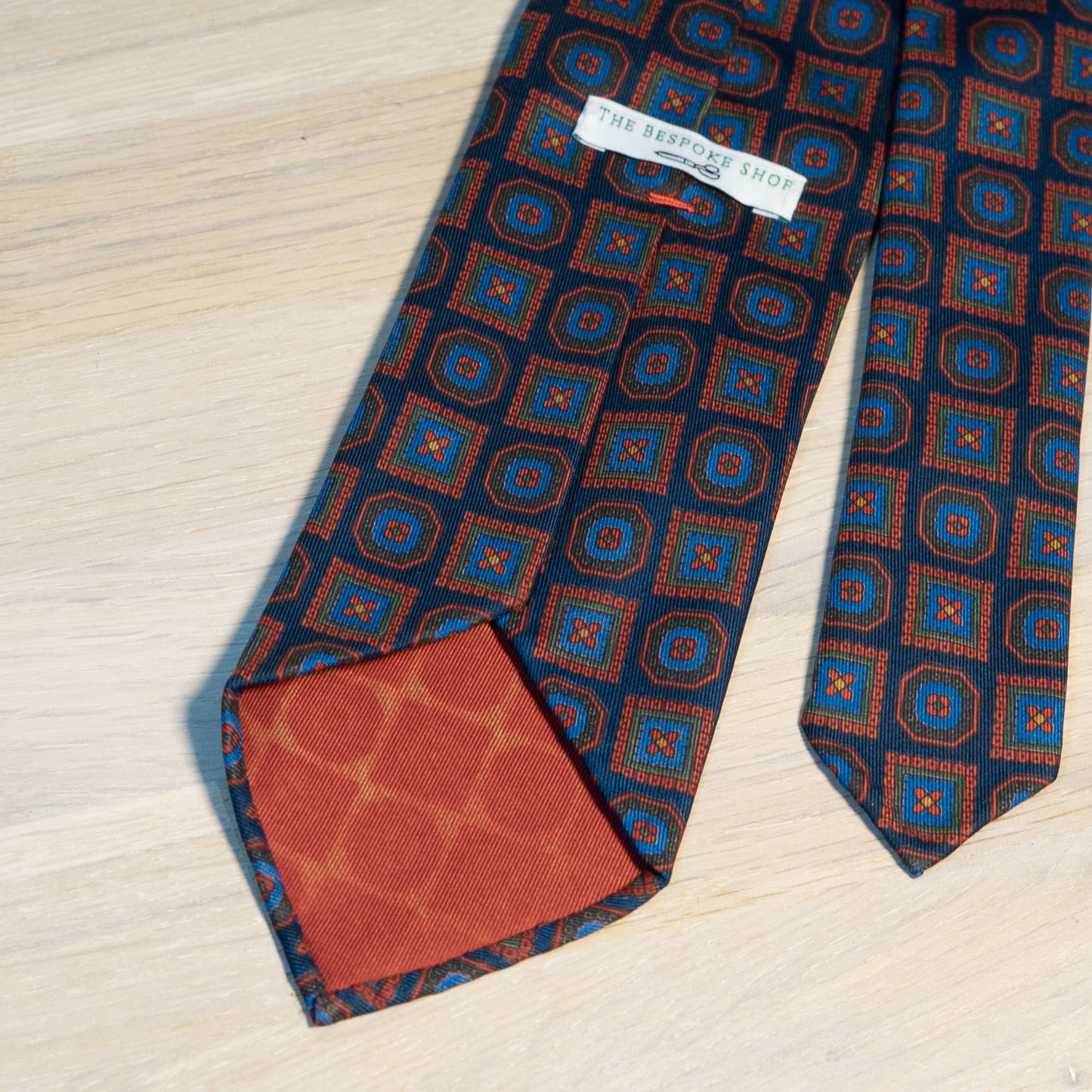 Navy/Red Medallion Ancient Madder Silk Tie Untipped - The Bespoke Shop 