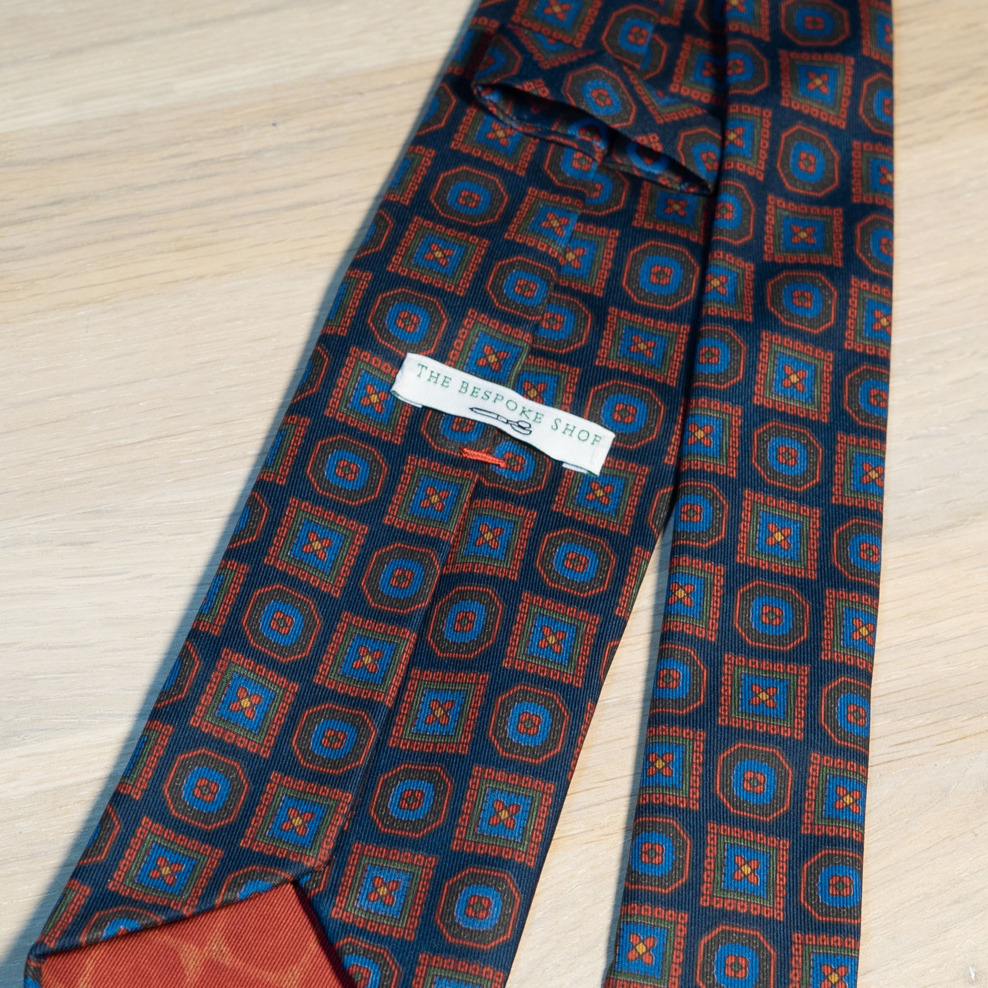 Navy/Red Medallion Ancient Madder Silk Tie Untipped - The Bespoke Shop 
